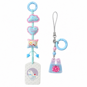 Add a soft pastel accent to your everyday accessories with this coordinated two-piece charm set. The 18 cm long cord charm features a blue cloud, heart, star details, and a white illustrated pendant. The 12.5 cm shorter charm pairs pink and blue beads with a miniature tote-shaped pendant. Attach them to a bag, key ring, or compatible tumbler handle together or style each piece separately.